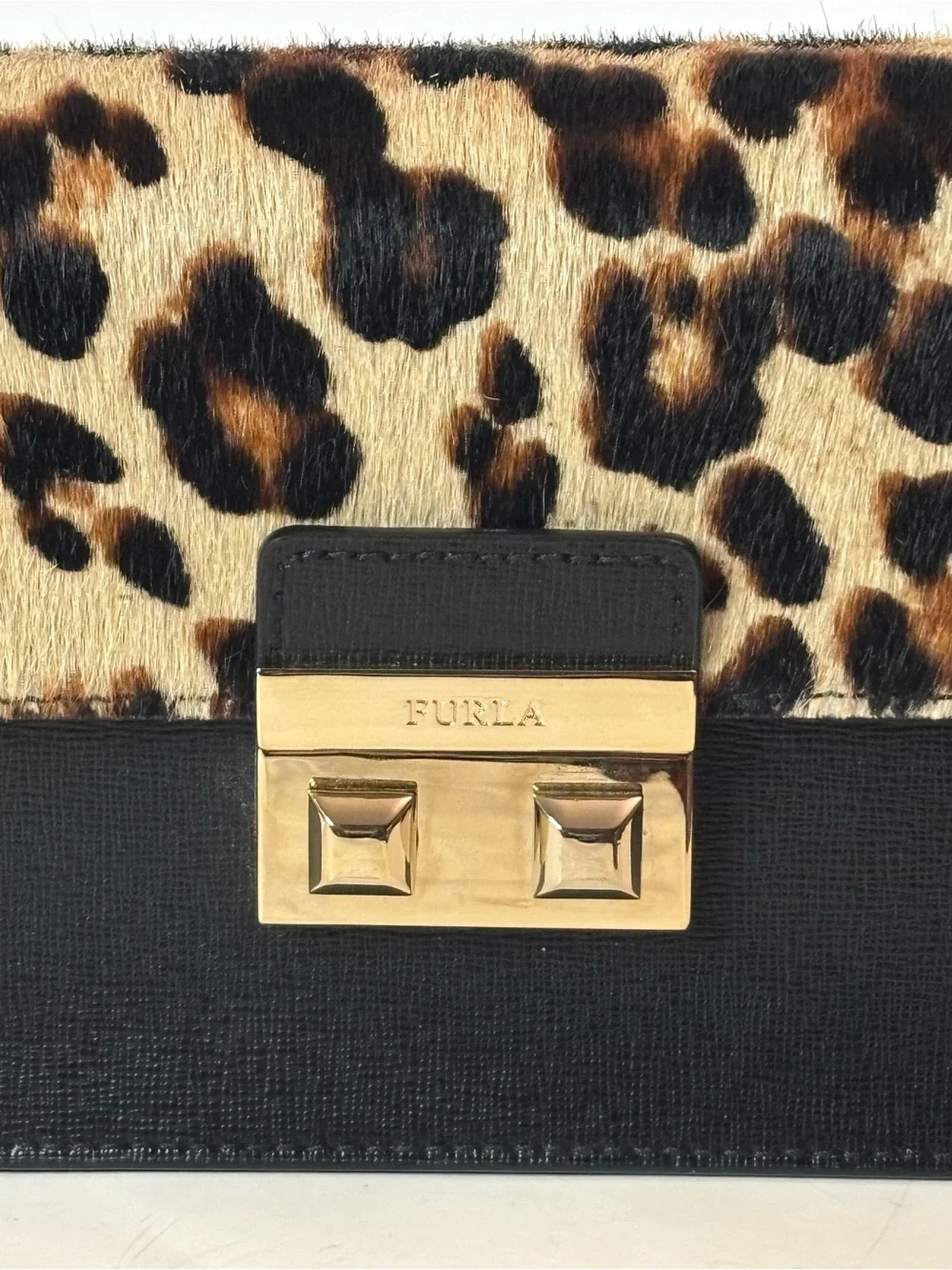 Furla Bella mini crossbody with leopard print calf hair and leather. Adjustable